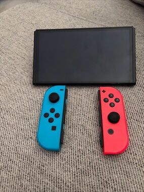 Nintendo Switch with Neon Blue and Neon Red Joy-Con